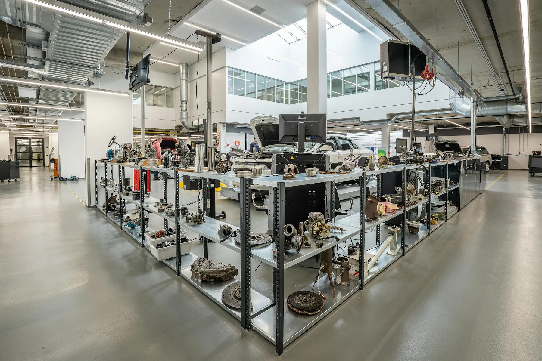 Automotive workshop with parts shelves photo
